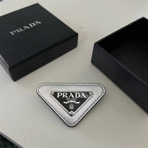 prada logo pin|prada triangular logo pin.